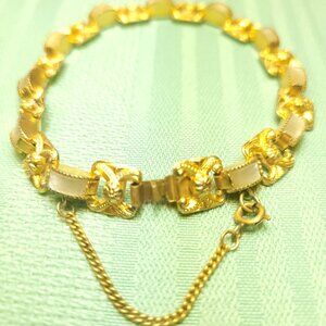 1960s Gold Tone Panel Bracelet White Thermoset Scrolls Safety Chain